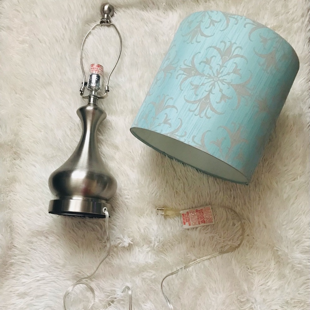 Teal elegant lamp shade with silver base. Unscrew-able lamp head fixture.